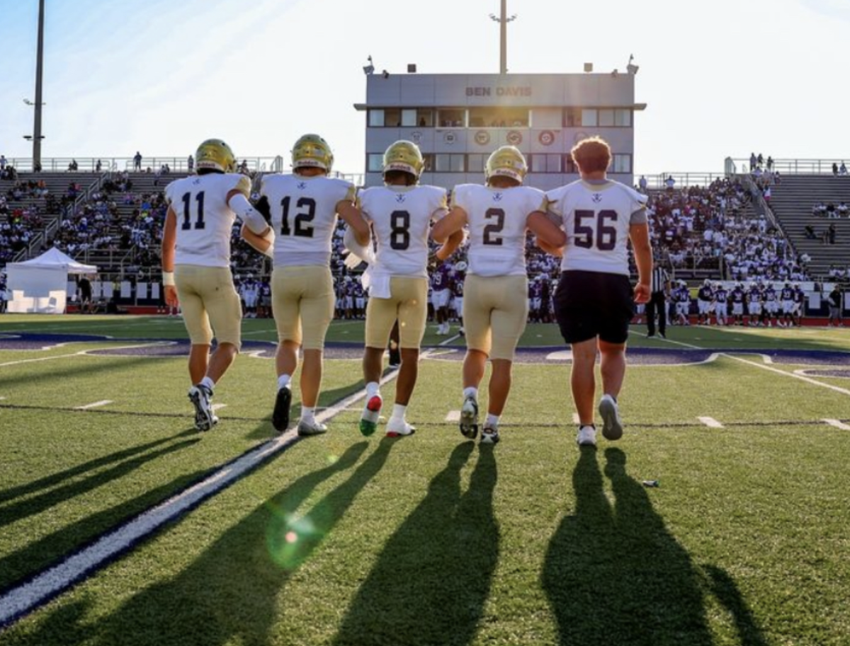 Senior captains take the field for the captains meeting for last Friday night's game against Ben Davis. The Cathedral Irish football team took down #1 ranked Ben Davis. #11 Jack Gause explained the feeling of walking towards the captain meeting as, “Definitely a different feeling to start a game. Time to lock in and play the game we know best.” 